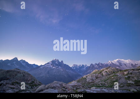 Snowy Mont-Blanc Mountains Range Peaks under Blue Starry Sky at Dawn