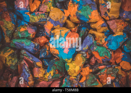 colored stains of paint on the rocks filter, abstract background Stock Photo
