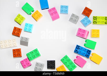 Moscow, RF, 04.09.2019: Plastic building blocks on a white background. Multi-colored cubes LEGO for children. White background Stock Photo