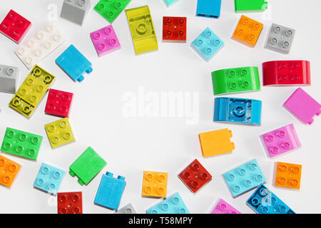 Moscow, RF, 04.09.2019: Plastic building blocks on a white background. Multi-colored cubes LEGO for children. White background Stock Photo