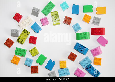 Moscow, RF, 04.09.2019: Plastic building blocks on a white background. Multi-colored cubes LEGO for children. White background Stock Photo