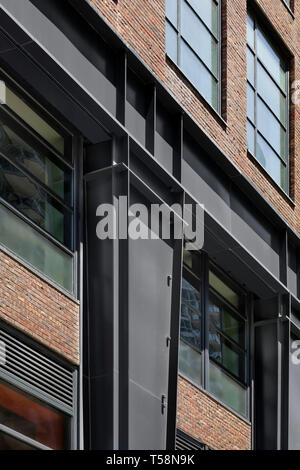 Detail of steel columns and brickwork at the base. Henry Hall, New York, United States. Architect: BKSK Architects, 2018. Stock Photo
