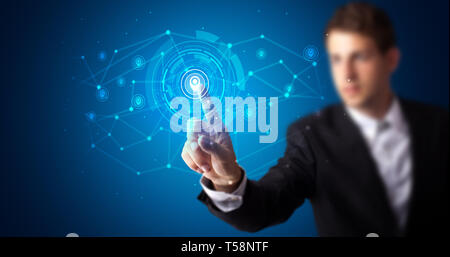 Man touching hologram screen displaying keys and locks Stock Photo