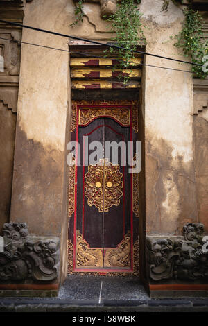 Decorated Door at the Entrance to a Temple in Bali, Indonesia Stock Photo