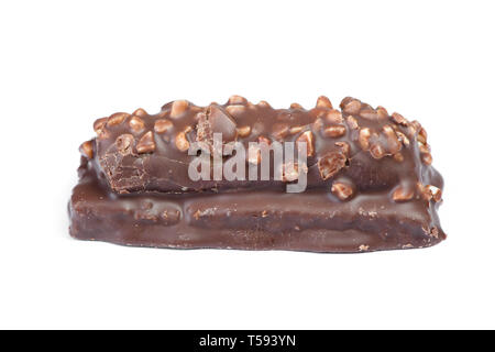 Small chocolate covered cake with crushed nuts isolated on white background Stock Photo