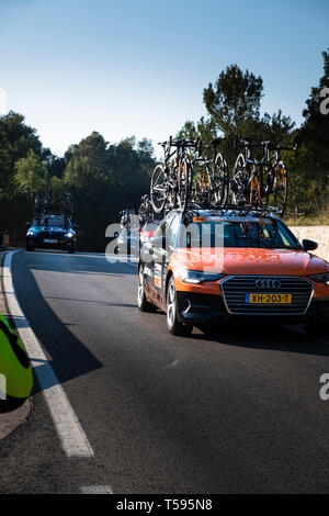 Woman's Cycle race support vehicles La Safor mountains near Gandia Spain Stock Photo