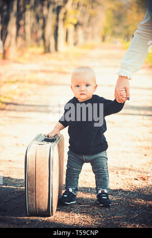 suitcase kid can sit on