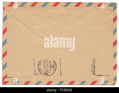 Old paper envelope with meter stamp on rear side and one side cut off. Russian inscription: "Manufactured" Stock Photo
