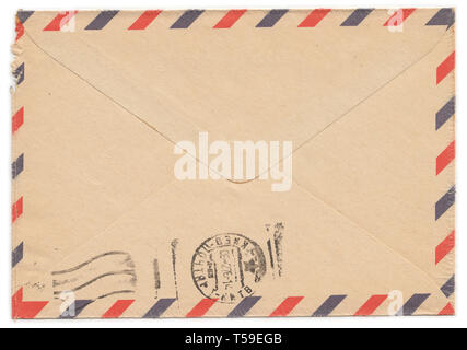 Old worn paper envelope with meter stamp on rear side Stock Photo