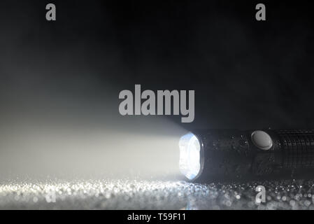 Tactical flashlight Stock Photo