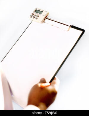 Hand writing on blank paper of black plastic clipboard Stock Photo