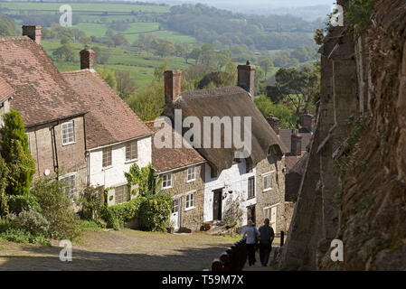 Shaftsbury, Dorset, England, UK. April 2019. Homes on the steep slope of Gold Hill in Shaftsbury, Dorset, UK a rural tourist attraction. Stock Photo