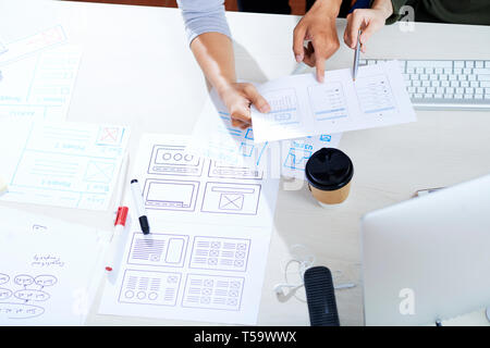 Discussing ux design for mobile app Stock Photo