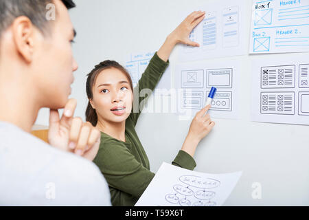 UX designer working with UI specialist Stock Photo