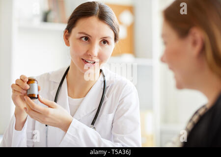 Obstetrician Giving Vitamins Stock Photo