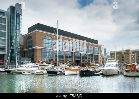 Boats moored in St Katherine Dock St Katherines Dock in Wapping in London. Stock Photo