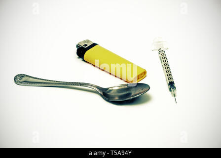 Heroin needle, instruments Stock Photo - Alamy