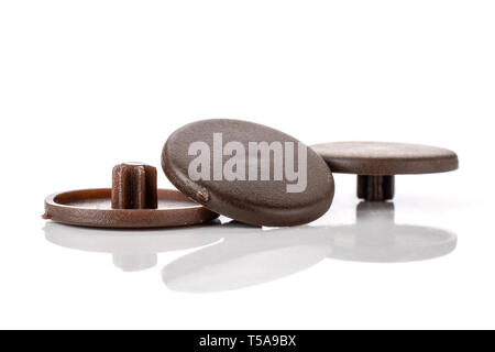 Group of three whole brown plast caps work item isolated on white background Stock Photo