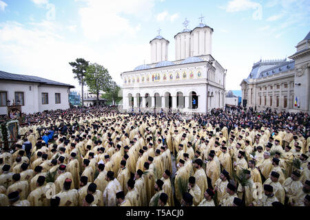 Bucharest, Romania - April 20, 2019: Romanian Orthodox priests during a Palm Sunday pilgrimage procession at the Patriarchal Cathedral in Bucharest Stock Photo