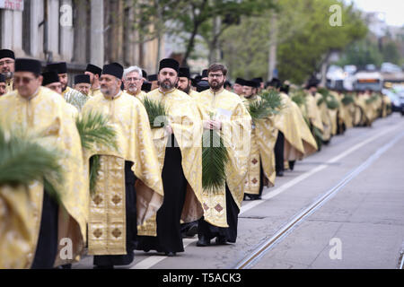 Bucharest, Romania - April 20, 2019: Romanian Orthodox priests during a Palm Sunday pilgrimage procession in Bucharest Stock Photo