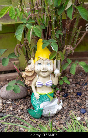 Garden gnome in the form of a mermaid Stock Photo