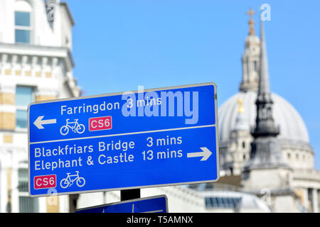 London, England, UK. Cycle route CS6 sign in the City of London, St Paul's Cathedral in the background Stock Photo