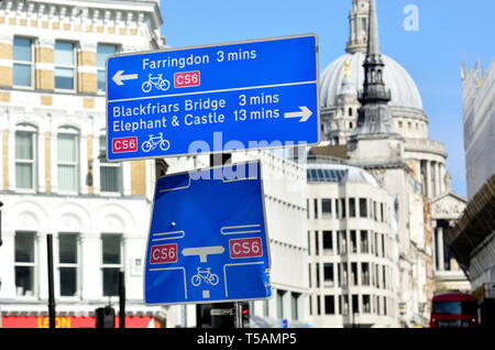 London, England, UK. Cycle route CS6 sign in the City of London, St Paul's Cathedral in the background Stock Photo