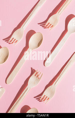 plastic items for food, isolated pink background, gift, present concept Stock Photo