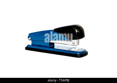 Close-up of a blue and black metal manual stapler isolated on a white background Stock Photo