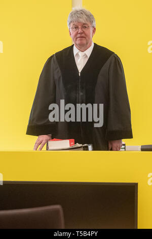 Amberg, Germany. 23rd Apr, 2019. Peter Jung, presiding judge, stands in the courtroom of the district court. Four young refugees have to answer in court because at the end of last year they allegedly attacked indiscriminately passers-by in the city centre of Amberg. Credit: Armin Weigel/dpa/Alamy Live News Stock Photo