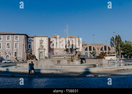 The fountain on the Piazza della Repubblica and The Basilica of St. Mary of the Angels and the Martyrs, Rome Stock Photo