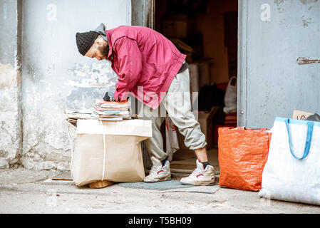 Old man collecting paper waste for a living central hong kong china ...