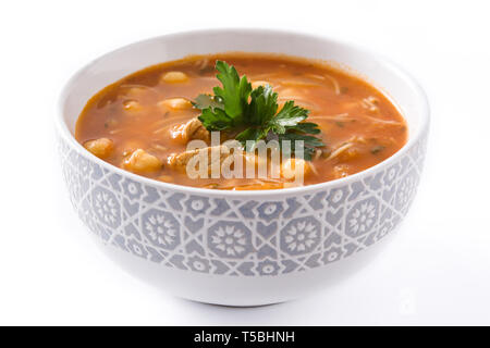 Harira soup in bowl isolated on white background. Typical Moroccan food. Ramadán concept. Stock Photo