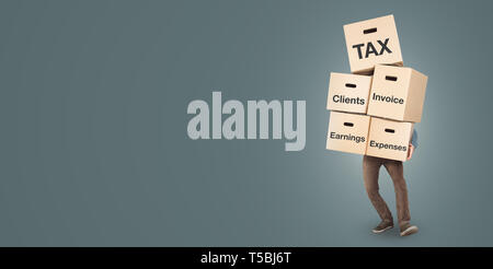 Accountant carrying a large stack of boxes for file storage Stock Photo
