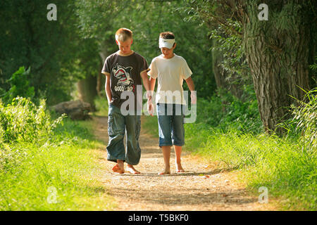 kids walking along a barefoot path at Bad Bodenteich in Northern Stock ...