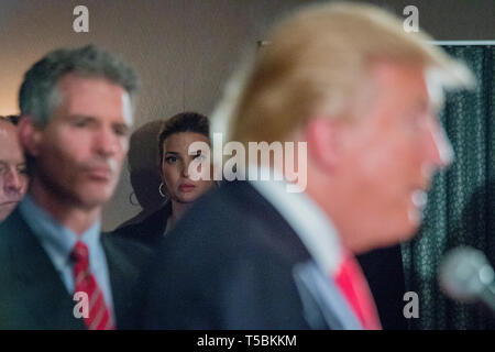 Ivanka Trump listens in the background as her father, the republican Presidential candidate Donald J. Trump hosts a press conference in Milford, NH, where he announced the endorsement from former Massachussetts Senator Scott Brown (left). Stock Photo