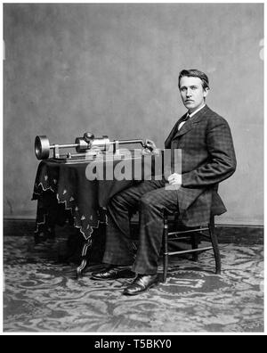 Thomas Edison (1847-1931), using his early Edison phonograph, portrait c. 1877 Stock Photo