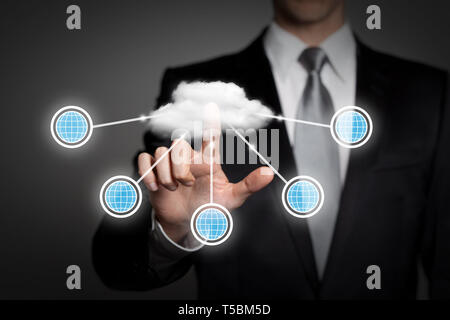 internet, technology, network, business concept - businessman in suit presses virtual touchscreen interface - cloud computing Stock Photo