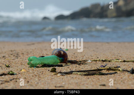 KwaZulu-Natal, South Africa, plastic pollution, objects, 2 PET food packaging containers washed up on beach by tide, bottles, close-up Stock Photo