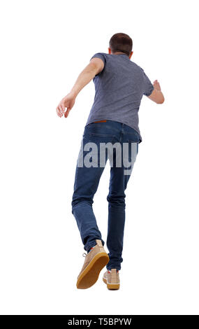 back view of running  man. backside view of person.  Rear view people collection. Isolated over white background. A young guy in yellow shoes runs ahe Stock Photo