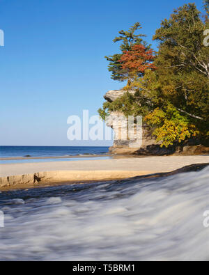 USA, Michigan, Pictured Rocks National Lakeshore, Chapel Rock overlooks creek and Lake Superior shoreline at Chapel Beach. Stock Photo