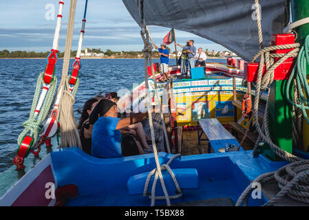 Boat trip on the Tagus River aboard the renovated traditional Varino boat in Moita town, Portugal Stock Photo