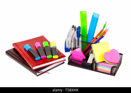 Stationery isolated on white. Notebooks, markers, pencils, rulers, stickers, stapler Stock Photo