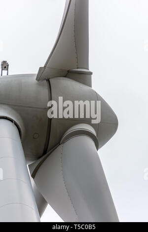 Detailed close up view of a wind turbines; generator, rotor and blade view on white background Stock Photo