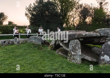 Every May Day morning (May 1st) the Foxwhelp Morris dancers perform at sunrise at Arthur's Stone, a Neolithic dolmen near Dorstone, Herefordshire, UK. Stock Photo