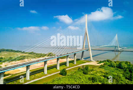 Aerial view of the Pont de Normandie, a cable-stayed road bridge that spans the river Seine linking Le Havre to Honfleur in Normandy, northern France Stock Photo