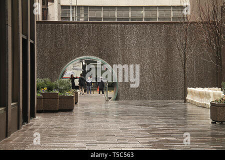 Glass Waterfall Tunnel at the McGraw-Hill Park in Midtown Manhattan, NYC, USA Stock Photo