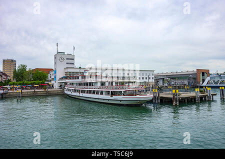 Friedrichshafen, Germany - June 09, 2017: An excursion boat has docked at the landing in front of the Zeppelin Museum. Stock Photo