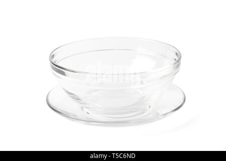 Empty transparent glass bowl for soup, and plate with a path isolated on white background. Stock Photo