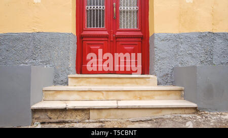Red Wooden Door in Corfu Town, Corfu, Greece Stock Photo